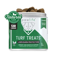 Pawlife Turf Treats jar with 120 soft chews for dogs, labeled as lawn burn protection and urinary and digestive support, featuring all-natural chicken flavor, cranberry, and digestive enzymes, designed to prevent yellow grass spots caused by pet urine, with visible open lid showing dark brown chews, green and white product label emphasizing natural ingredients and pet health benefits.